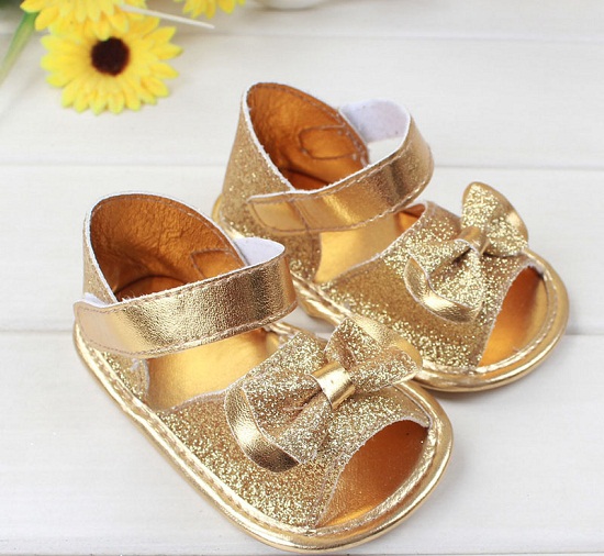 gold baby booties